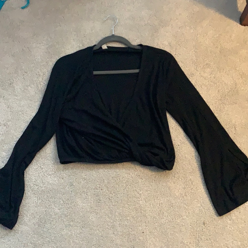 Long sleeve top with crossed plunging neckline